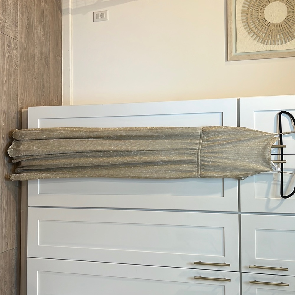 Sheer gold jumpsuit with lining. Gorgeous and in decent condition.